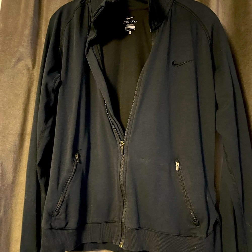 Nike AirDri Women’s lightweight zip front jacket